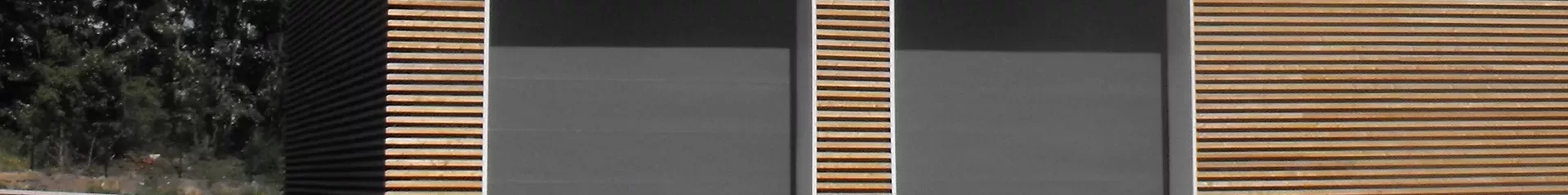 Acoustic curtain and sectional doors